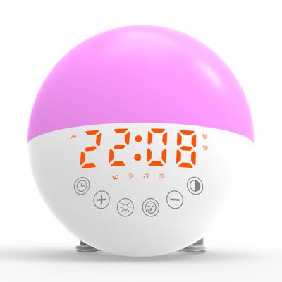China Cute Oval Portable Alarm Clock Radio Touch Sensing Multi Color for sale