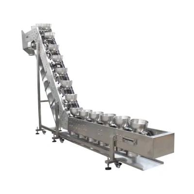 China Bowl Type Conveyor Assembly Line Food Processing Inclined Bucket Elevator for sale
