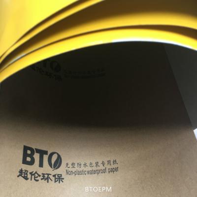 China Rolo de empacotamento de papel amarelo brilhante reciclado do peso 160gsm à venda