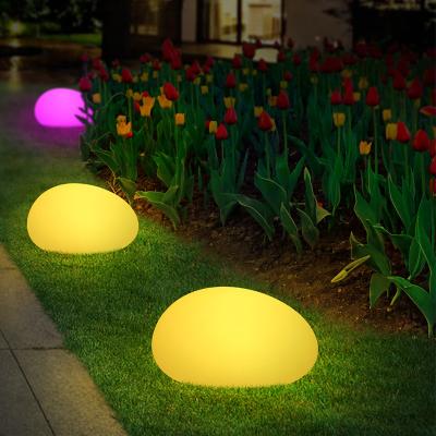 China Outdoor Garden Stone Solar Lawn Light Ground Plug Colourful LED Solar Lights for sale