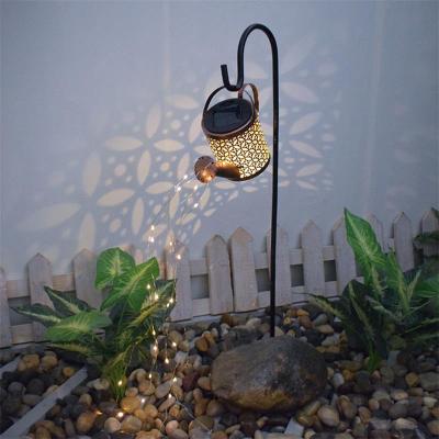 China Solar Creative Iron Kettle Shower Floor Lamp for Outdoor Garden Landscape for sale