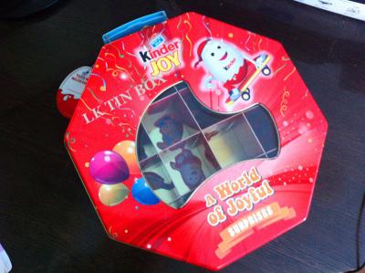 China Octangle Packaging Metal Tin Box Ferrero Kinder Joy Toy With Divder Inside And Pvc Window for sale