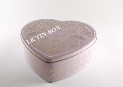 China Lata en forma de corazón del caramelo de la boda con la tapa grabada en relieve, caramelo duro en latas en venta