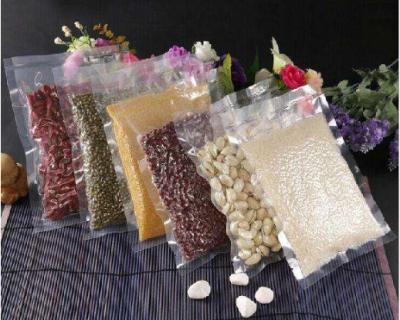 China Cheap Transparent Vacuum Embossed Plastic Packing Punctual Resistant Rice Vacuum Storage Bags with handle for sale
