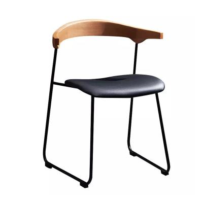 China Stable Popular PU Dining Chair With Curved Supporting Legs Modern for sale
