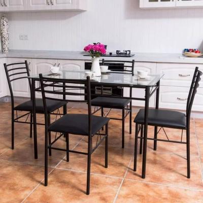 China Anti Wear 5 Piece Metal Dining Table Set Tempered Glass Top Table And Chairs for sale