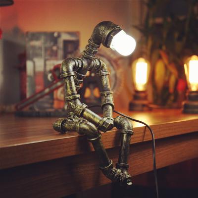 China Vintage Iron Robot Table Lamp Living Room Art Deco E27 Retro Beside Lamp(WH-VTB-25) for sale