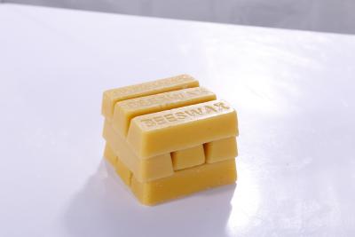 China 100% Organic Pure Beeswax Block 28g Handmade Yellow Food Cosmetic Grade Beeswax Bar for sale