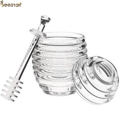 中国 感動的な棒の水晶小型蜂蜜の瓶が付いている2つのタイプ透明な蜂の蜂蜜の鍋そしてスプーン 販売のため