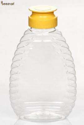 中国 卸し売り工場価格375mlの特別なプラスチック蜂蜜の瓶および蜂蜜のためのプラスチックびんをスプーンでつぐため 販売のため