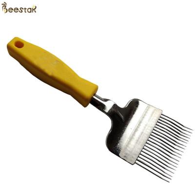 China Durable Yellow Hive Tools stainless steel Honey Uncapping fork with plastic handle for sale
