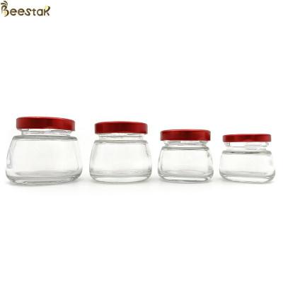 Chine 50ml 75ml 120ml 150ml Honey Jar And Spoon Glass Honey Pot Jars à vendre