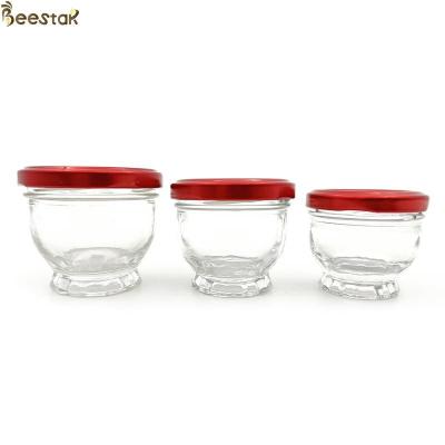 China 50ml 75ml 100ml Mini Glass Honey Jars Glass Honey Bottle en venta
