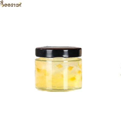 China 25ml 50ml Wide Mouth Glass Jam Jar Honey Glass Bottles In Stock Bee Honey Glass Jar for sale