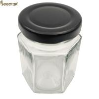 China 35ml Muti Prismatic Bottle 45ml 65ml 85ml Clear Hexagon Glass Honey Jar for sale