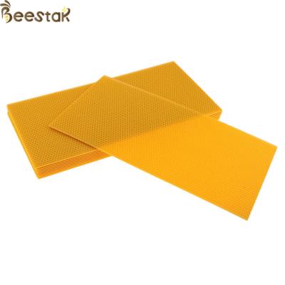 China Beekeeping tools premium grade Food grade 100% pure yellow beeswax comb foundation sheet for sale