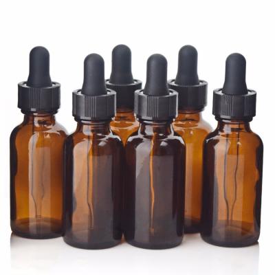 China Non - Toxic Round Shoulder Custom Glass Bottles With Plastic Black Dropper For Serum for sale