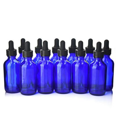 China Blue Glass Dropper Bottles With Round Bottom And Black Child Resistant Cap for sale