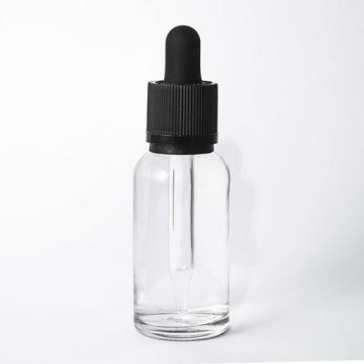 China Smooth Open Clear Glass Essential Oil Dropper Bottles With Child Resistant Cap for sale