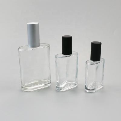 China 30ml - 100ml heló la botella de perfume recargable/la botella de cristal transparente del espray en venta