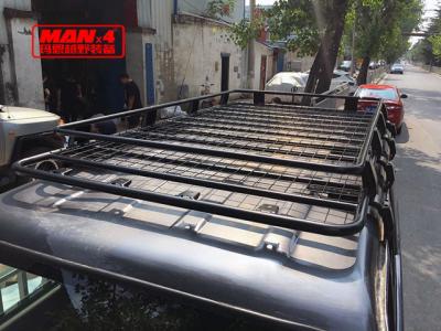 China A grade de tejadilho 4x4 universal de aço do OEM para o veículo da calha da chuva pulveriza revestido à venda