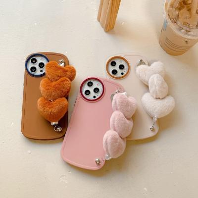 China 2022 Ins style big Round Camera Lens Hole mobile phone bags & cases Love plush bracelet sublimation phone cases for sale