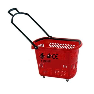 China Retail Grocery Plastic Shopping Basket With Wheels Red 35L 45L 50L 60L for sale
