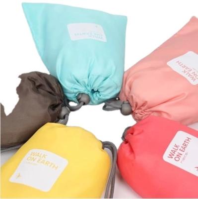 China Folded Polyester Fabric Drawstring Bag Mini Gift Pouch Shoes Pocket Storage Pouch for sale