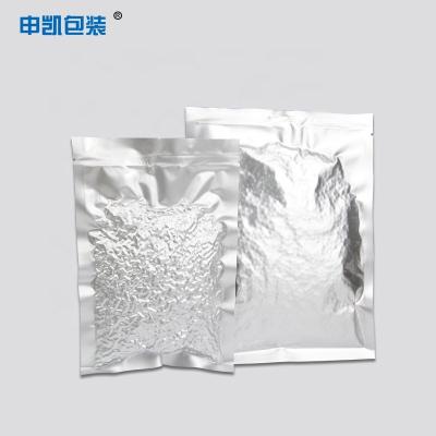 China Custom Food Storage Bag Vacuum Seal Compressed 0.6mm Silver Aluminium Foil Pouch for sale