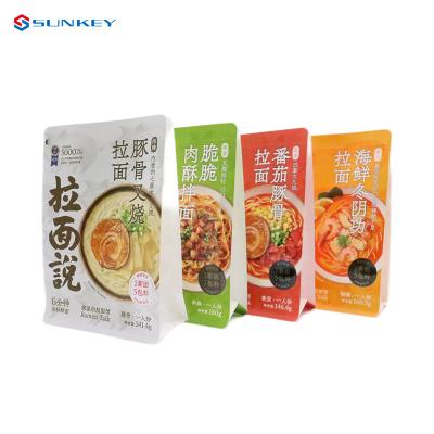 China Ziplockk Resealable Laminated Packaging Pouches Transparent Flat Bottom Standing Pouch for sale
