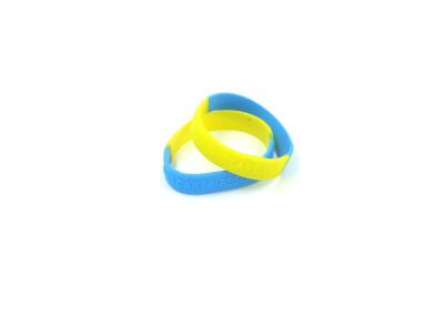China Eco Friendly Cool Silicone Bracelets , Segmented Embossed Silicone Wristbands for sale