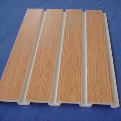 China Natural Wood Grain Decorative Slatwall Panel Pvc With Metal Hooks for sale