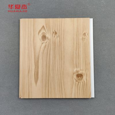 中国 Direct Sale Wooden Grain Pvc Decoration Wall Panel Pvc Material Plastic Ceiling Wall 販売のため