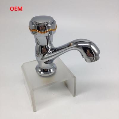 China Modern Metered Tap Faucet Deck Mounted Zinc Basin Faucet  Cold Water Single Lever for sale