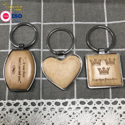 China Hot Sale Wood Keychain Blank Key Chain Custom Design Printed Laser Engraved Logo Key Tag Wooden Key Ring à venda