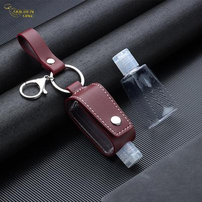 China Factory Custom Promotion Gift portable bottle holder Leather Hand Sanitizer Holder Keychain Te koop