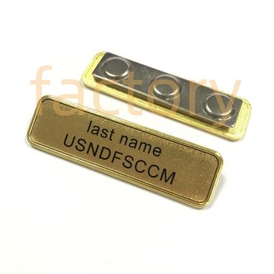 China wholesale gold plated labels engrave concave custom embossed brand name logo tags metal name tag with magnet Te koop