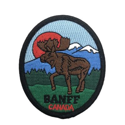 China Moose Shape Chenille Embroidery Patch PVC Silicone Rubber Custom Logo With Border for sale