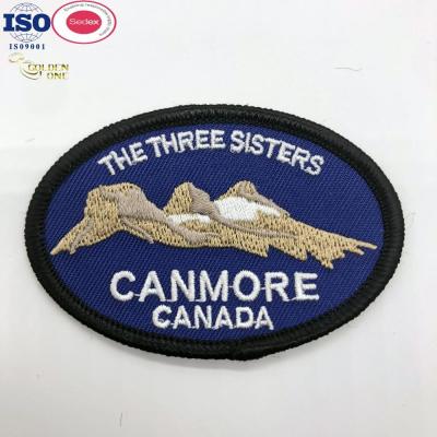 China Hat Chenille Embroidered Cloth Patches Iron On Custom Silicone Rubber for sale