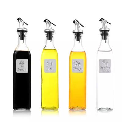 China Custom Glass Bottle 650ml 330 Clear Glass Olive Oil Dispenser Bottle with Cap Olive Oil for sale