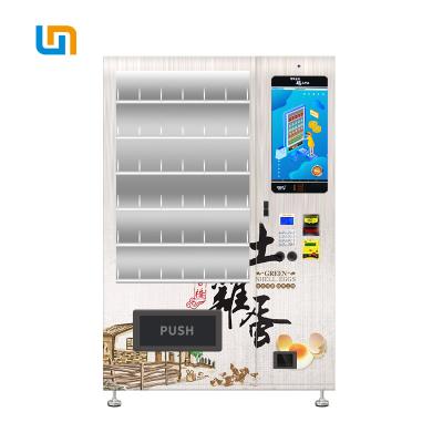 Chine Légumes et distributeur automatique d'ascenseur de bande de conveyeur de boîte à fruit vidéo avec d'écran personnalisable d'autocollant et de logo jeu à vendre
