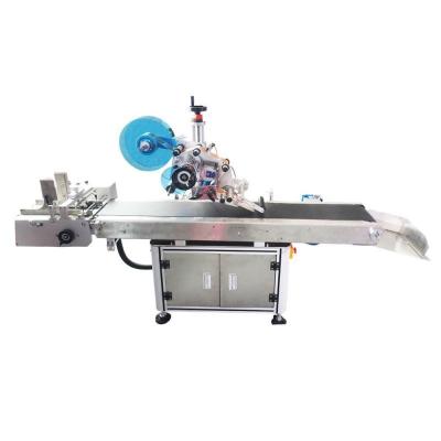 China Suction Type Card Labeling Machine High Accuracy Automatic Label Applicator Machine for sale