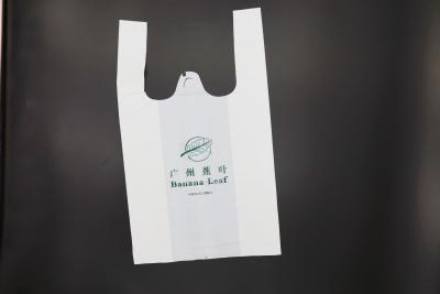 China 11 Micron Hdpe Biodegradable Plastic Bags Roll Clear White For T Shirt for sale