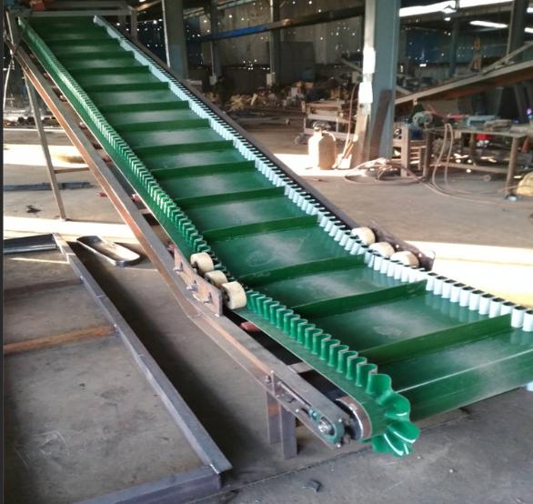 Green inclined conveyor belt installation view