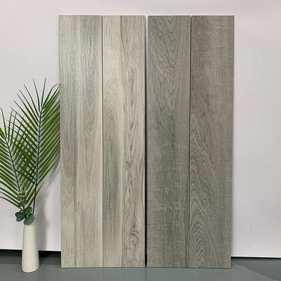 中国 Full Body Solid Wood Imitation Texture Matte Finished Interior Porcelain Wooden Rustic Floor Tiles 販売のため