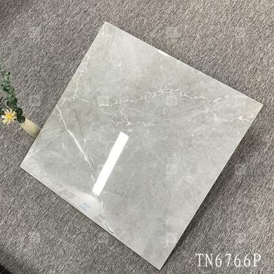 Cina Nuovo design corpo intero colore grigio aspetto marmoreo porcellana piastrelle lucide per pavimento interno e parete 600x600mm in vendita