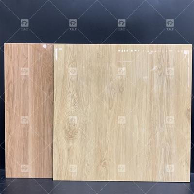 중국 고 광택 인테리어 나무 모양 포르셀린 바닥 타일 반 미끄러움 닦은 가시화 된 포르셀린 거실 타일 바닥 판매용
