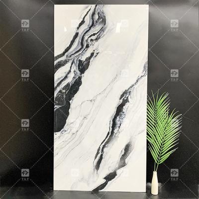 China Panda Wit Marmer Look Porseleinen tegels 600x1200mm Slab voor woonkamer Wand Decor Luxe Steen voor winkels Te koop