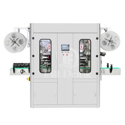 China Steam Generator Bottle Labeling Equipment Double Head Sleeve Labeling Machine for sale