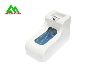 China Plastic Automatic Shoe Cover Dispenser Machine With Microcomputer Controlled for sale